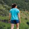 001026_TL_01_graphic_tee_brand_w_teal_lifestyle_3.jpg